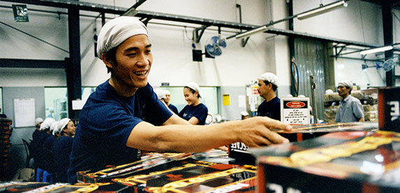 Trabajador vietnamita en la industria del café